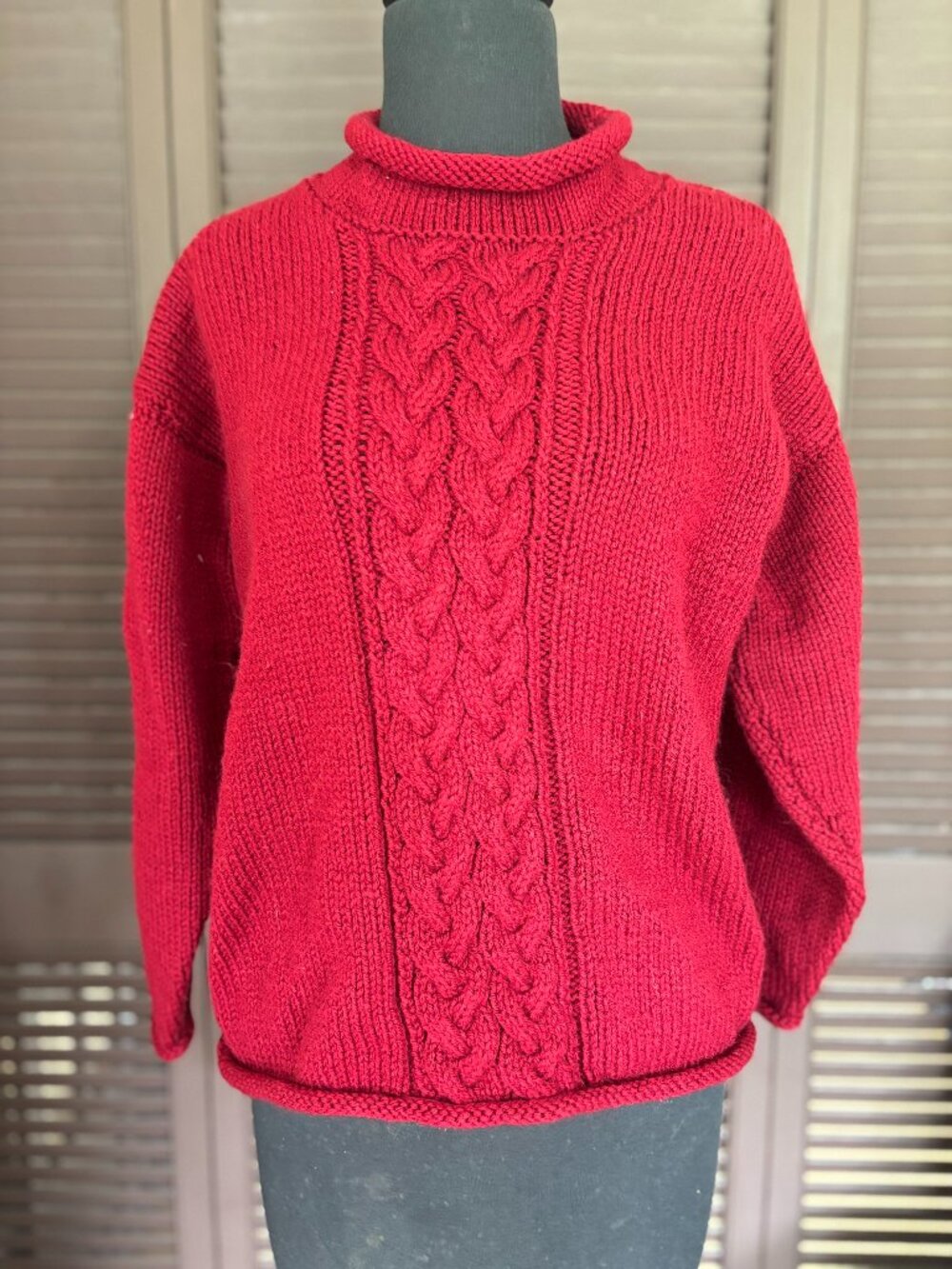 Bright red boxy hand knit sweater